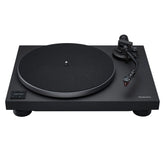 Black turntable with a white background