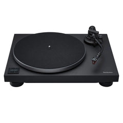 Black turntable with a white background