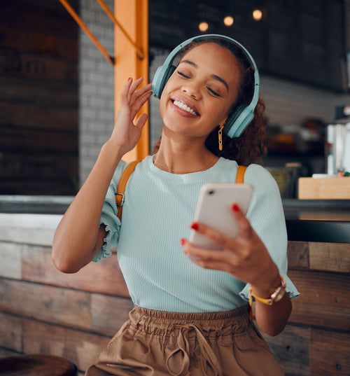woman listening to music with headphones