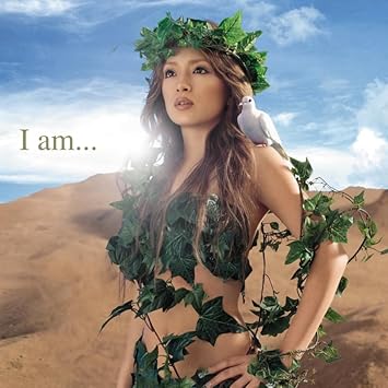 Woman with greenery and a dove against a blue sky and desert landscape