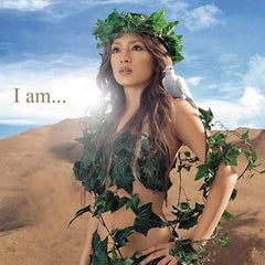 Woman with greenery and a dove against a blue sky and desert landscape