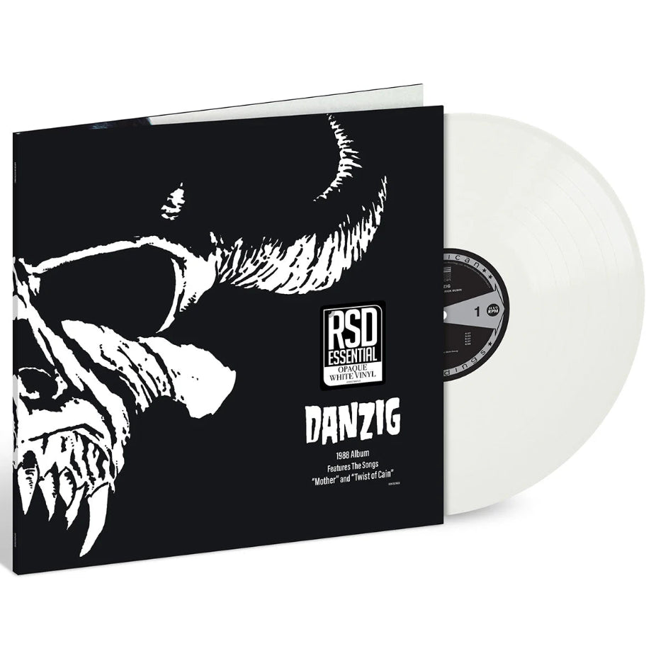Vinyl record with black and white cover featuring a creature's face, labeled 'Danzig' on a white background.