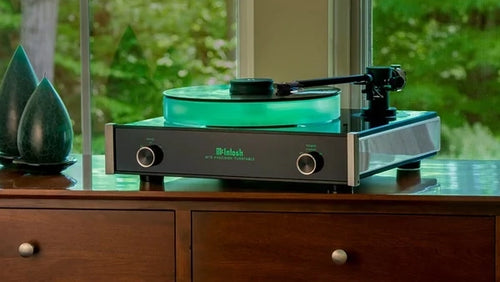 A High End Turntables banner for Audio Exchange, featuring a McIntosh Audio turntable